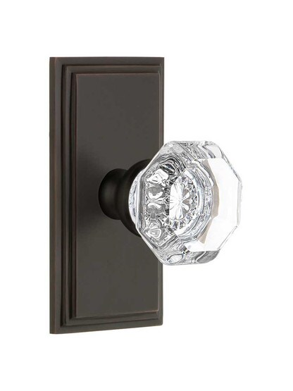 Grandeur Carre Rosette Door Set with Chambord Crystal-Glass Knobs in Timeless Bronze.